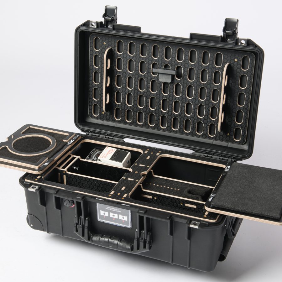 The Peli Air 1535 case with our manufactured, secure Mobile Guitar Workstation.